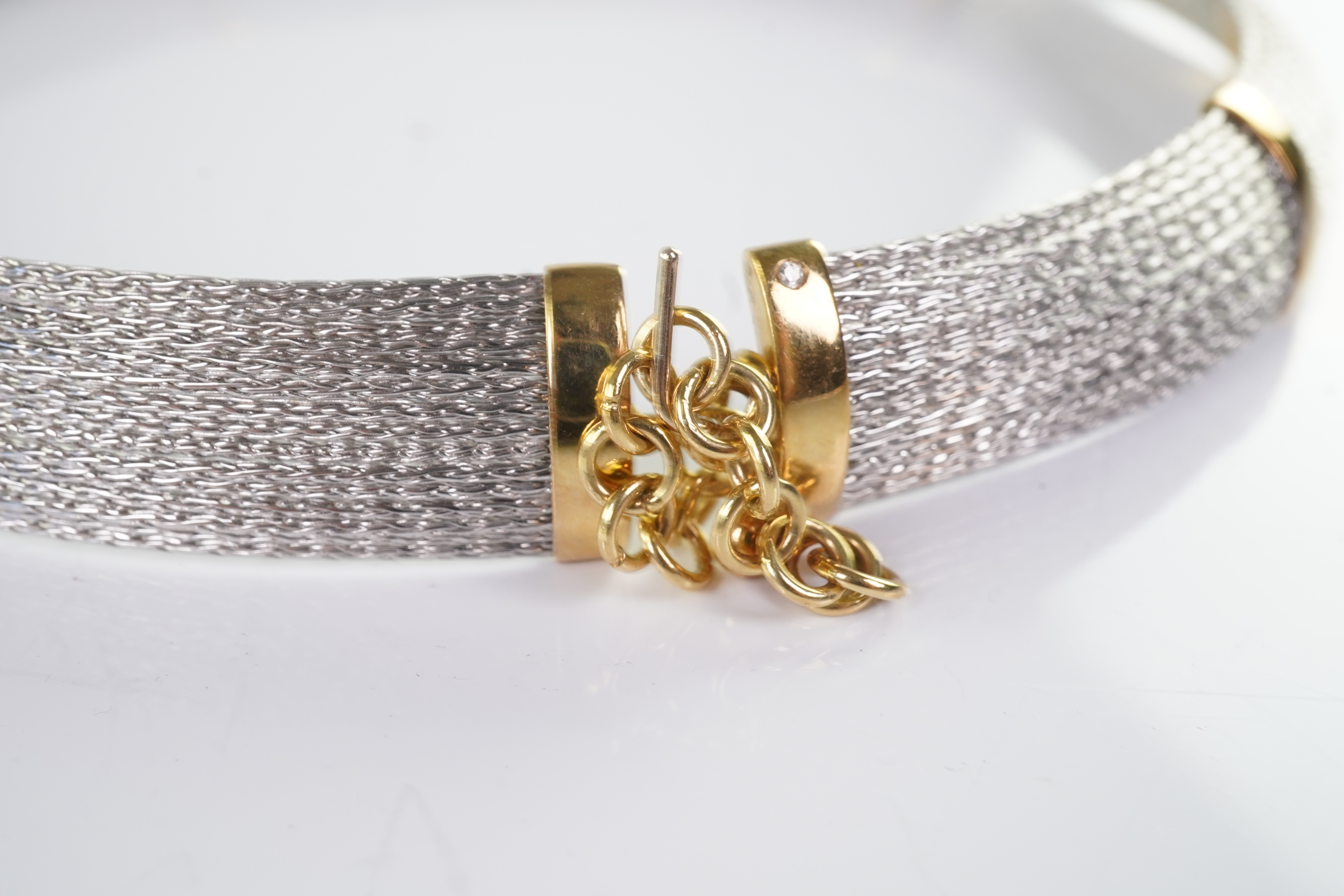 An 18ct gold collar and bangle